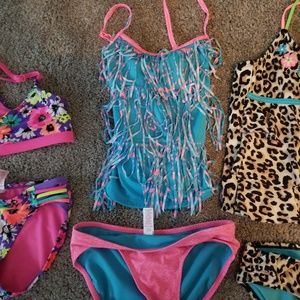Lot of four girl's bathing suits